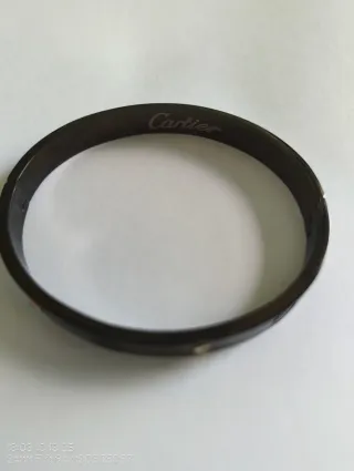 Pulsera Cartier LOVE Negra y Dorada