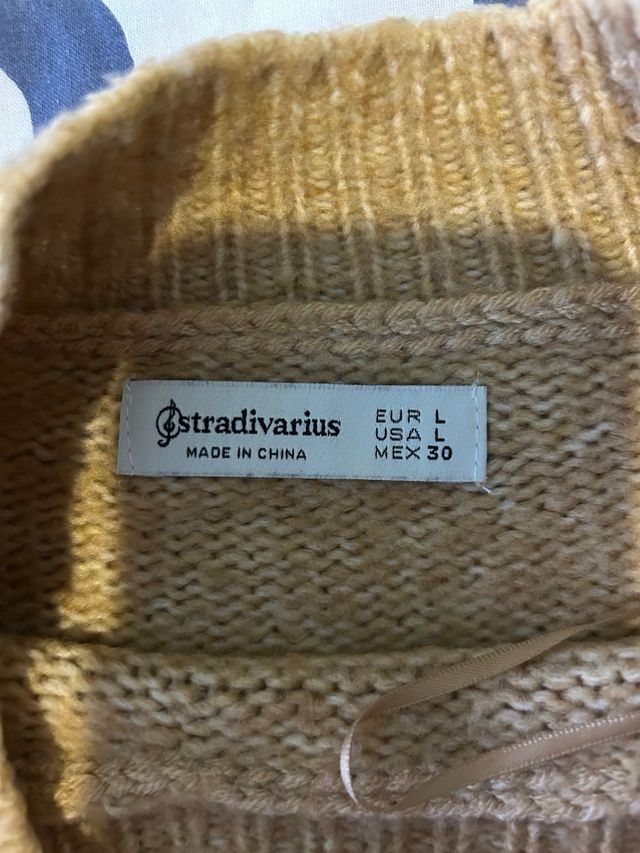 Jersey beige y gris de punto