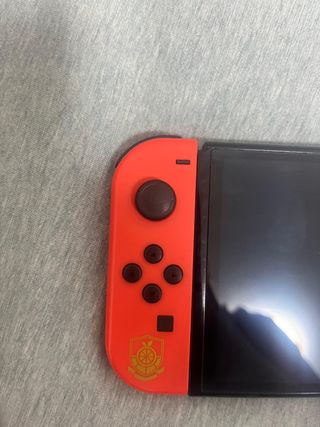 Nintendo Switch Oled Pokémon púrpura Semi Nueva.