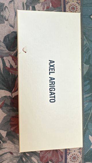 Gafas de sol Axel Arigato negras y amarillas