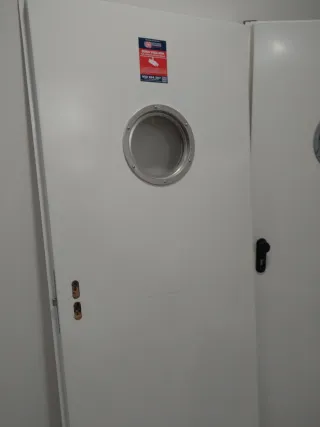 Puerta Cortafuegos con Ventana Redonda