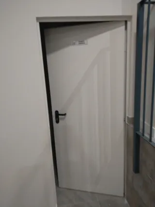 Puerta Cortafuegos con Ventana Redonda