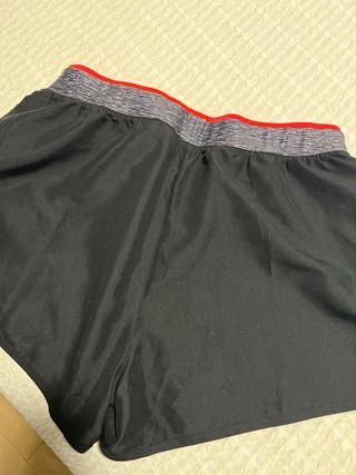 Pantalón deportivo Domyos negro y rosa fucsia