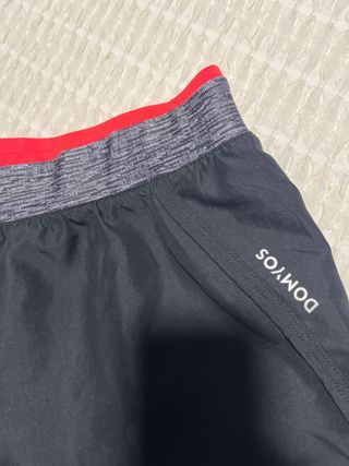 Pantalón deportivo Domyos negro y rosa fucsia