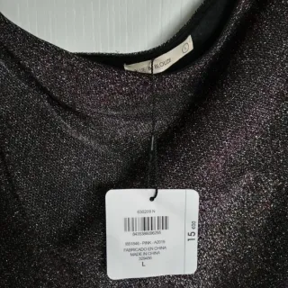Blusa asimétrica brillante