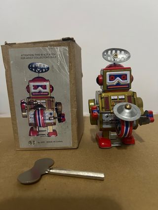 Robot latta vintage con chiave collezionisti