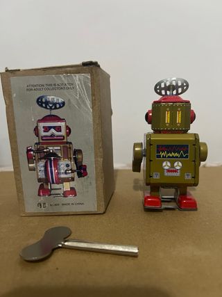 Robot latta vintage con chiave collezionisti