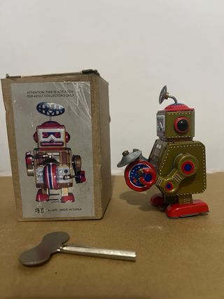 Robot latta vintage con chiave collezionisti