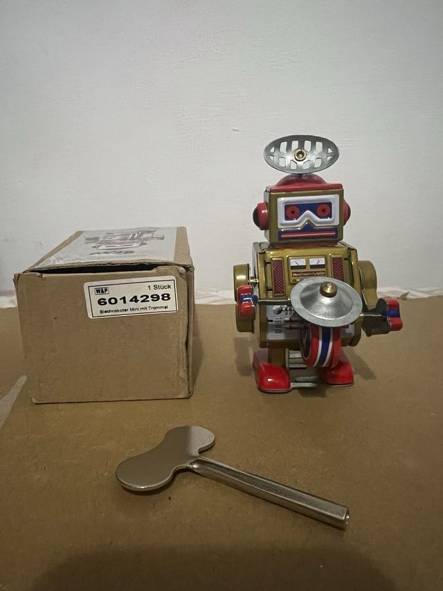 Robot latta vintage con chiave collezionisti