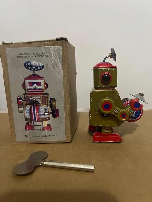 Robot latta vintage con chiave collezionisti