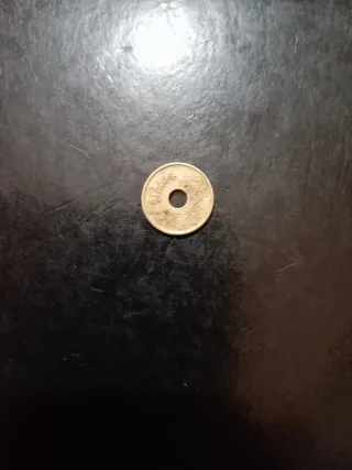 Moneda antigua 25 centavos