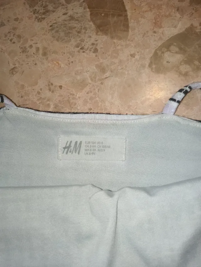 Mono de tirantes a rayas blanco y negro