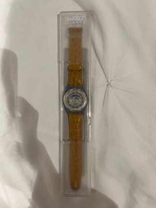 Reloj Swatch Quartz Mundo