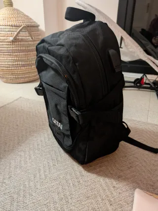 Mochila pequeña de viaje con USB