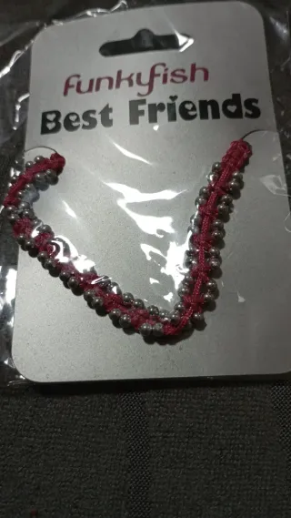 Pulseras de hilo con cuentas plateadas 0'50 cada u