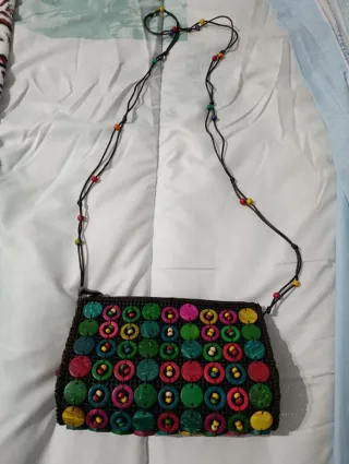 Bolso  con flores de coco