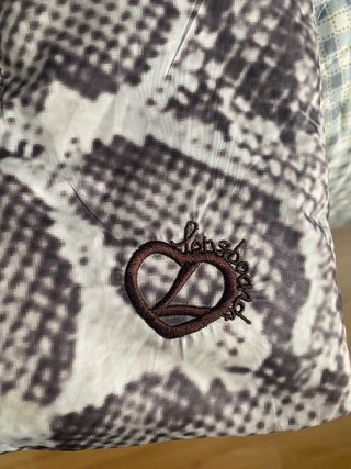 Chaqueta acolchada estampado serpiente