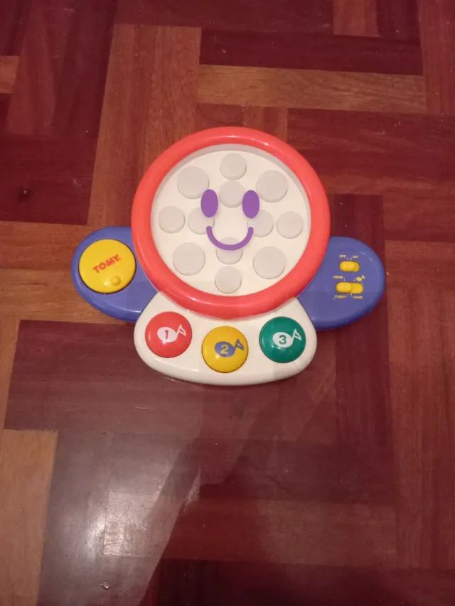 Juguete musical Tommy interactivo