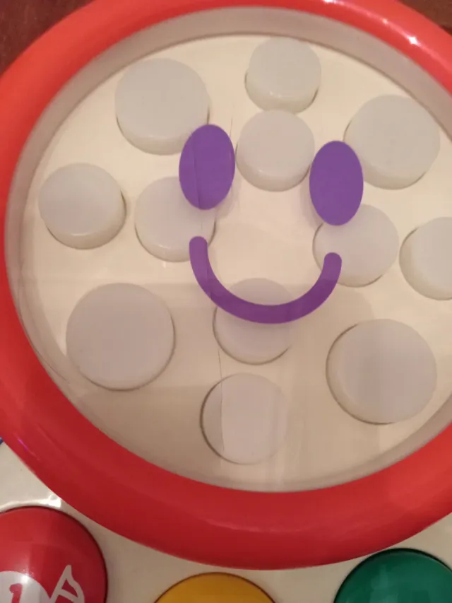 Juguete musical Tommy interactivo