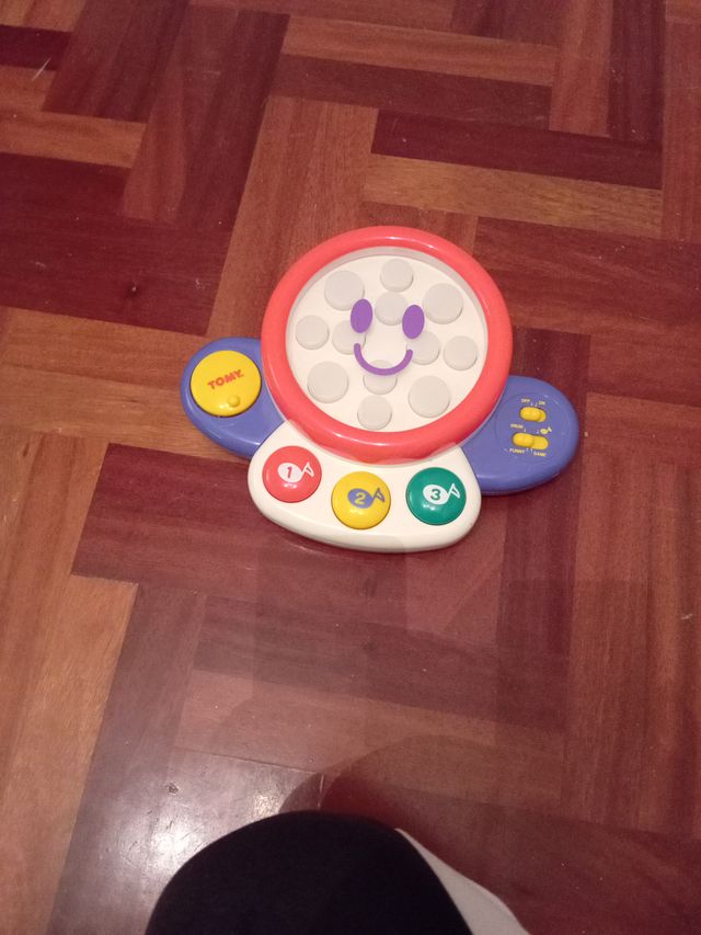 Juguete musical Tommy interactivo