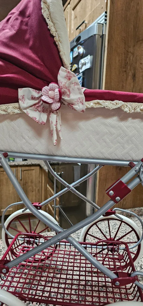 Coche de muñecas vintage con capota