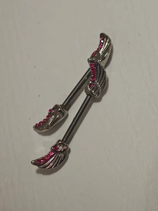 Piercing Pezones Alas con Circonitas Rosas