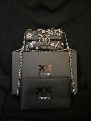 Borsa Pinko nera con dettagli argento