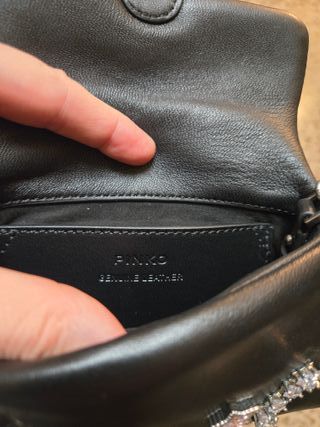 Borsa Pinko nera con dettagli argento