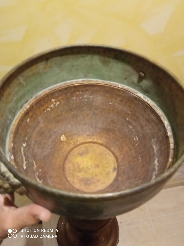 Peana de bronce con leones