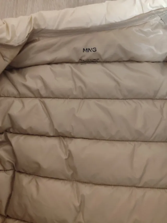 Plumas ligero beige, nuevo