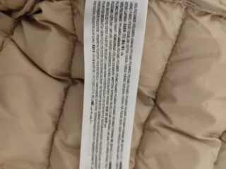 Plumas ligero beige, nuevo