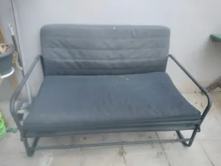 Sofá cama gris y negro