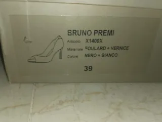 Zapatos de tacón blancos y negros talla 39