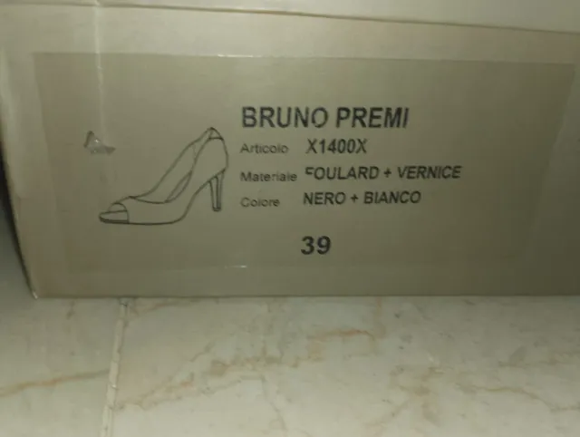 Zapatos de tacón blancos y negros talla 39