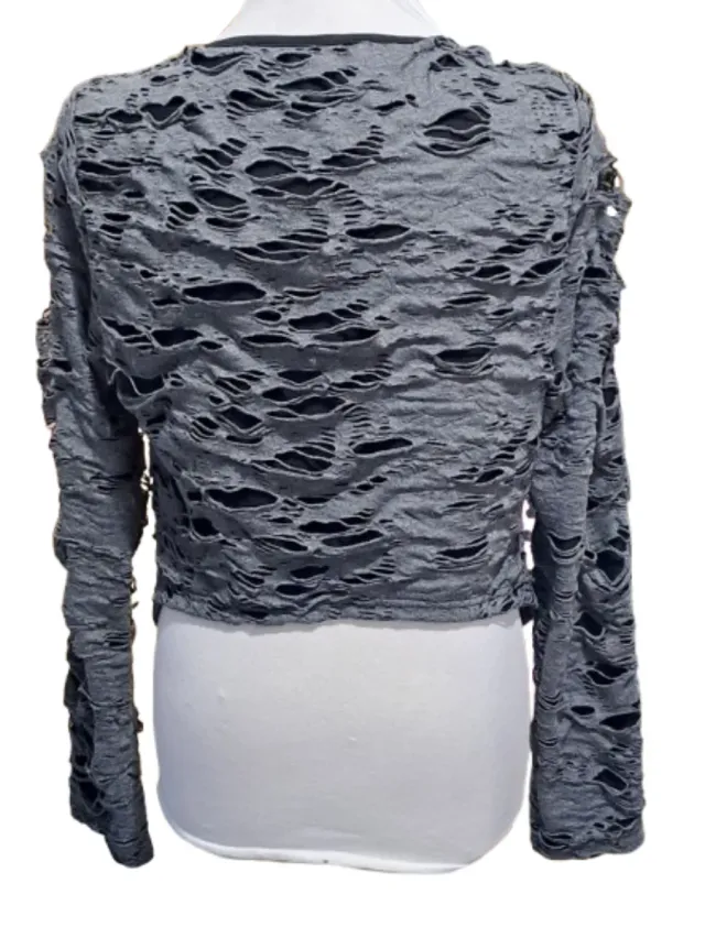 Chaqueta estilo punk  rock con rotos