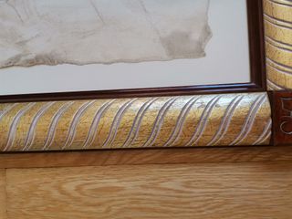 Pareja de cuadros con lámina de papel