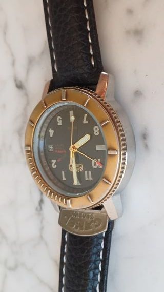 Reloj Camel Trophy Oro y Negro