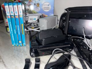 Nintendo Wii U+Mario Kart 8+4 Giochi+Accessori