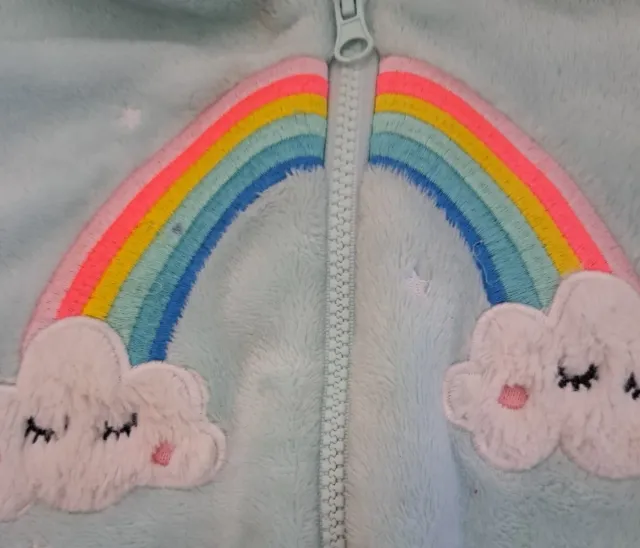 Buzo polar Primark arcoíris y nubes