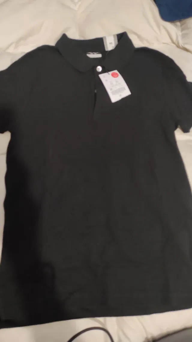 Polo negro manga corta