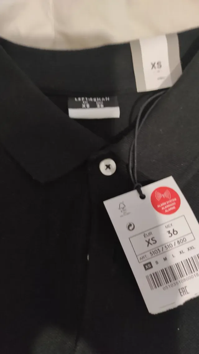 Polo negro manga corta