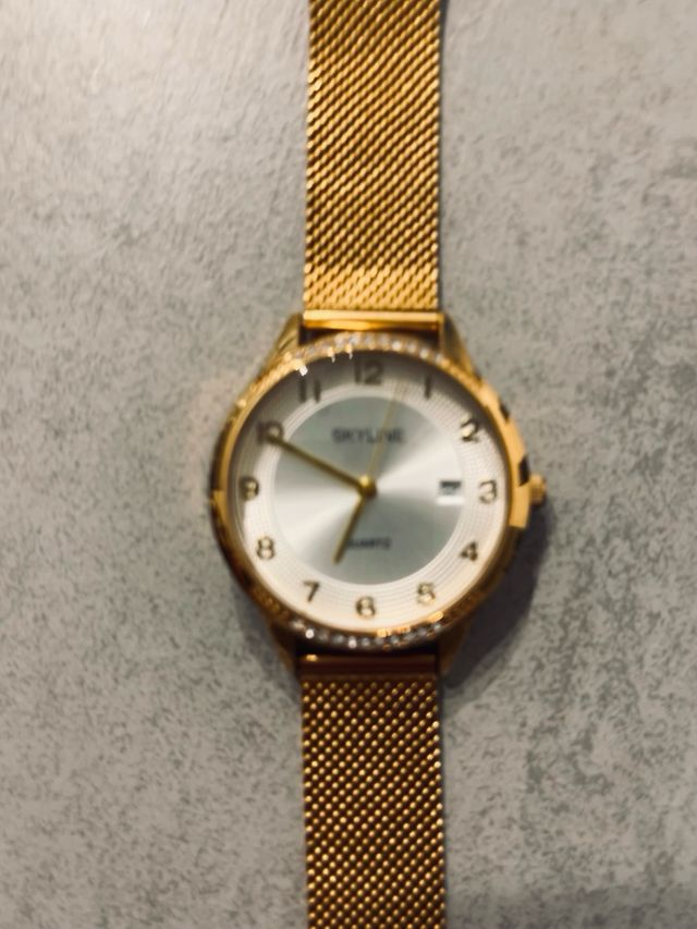 2 Relojes SKYLINE Oro y Plata