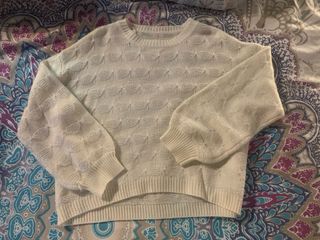 Jersey blanco roto tejido con detalles brillantes