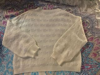 Jersey blanco roto tejido con detalles brillantes