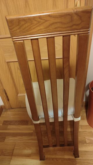 Mesa de comedor de madera y 8 sillas