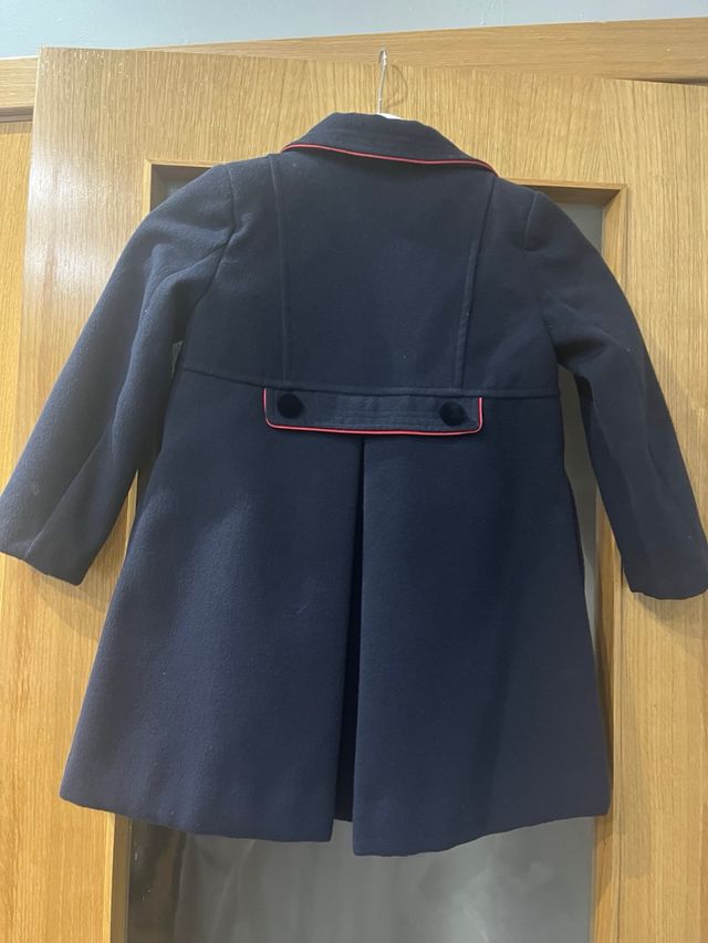 Abrigo niña azul con lazo rojo talla 5 y da talla