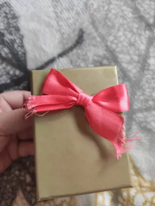 2 Colgantes: Muñeca y Muñeca sin boca