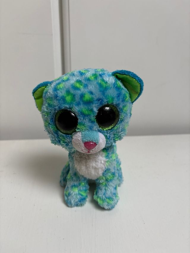 Peluche ojos grandes azul y verde