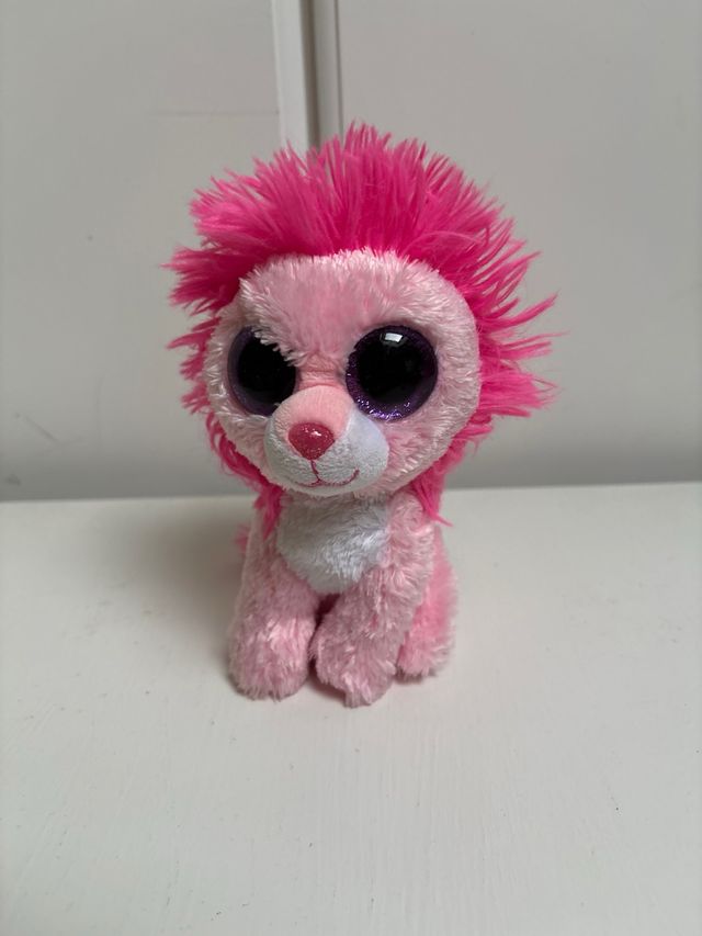 Peluche león rosa ojos grandes