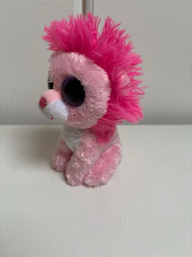 Peluche león rosa ojos grandes